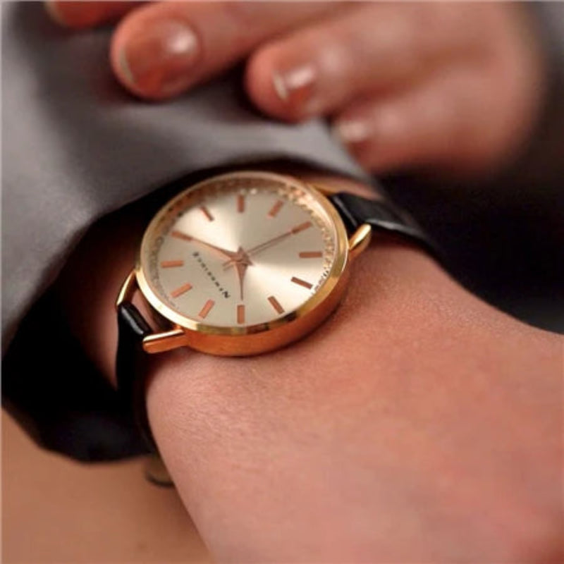 Ladies Round Face Black Leather Strap Watch